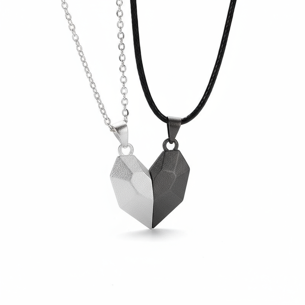 Matching heart necklaces on white background